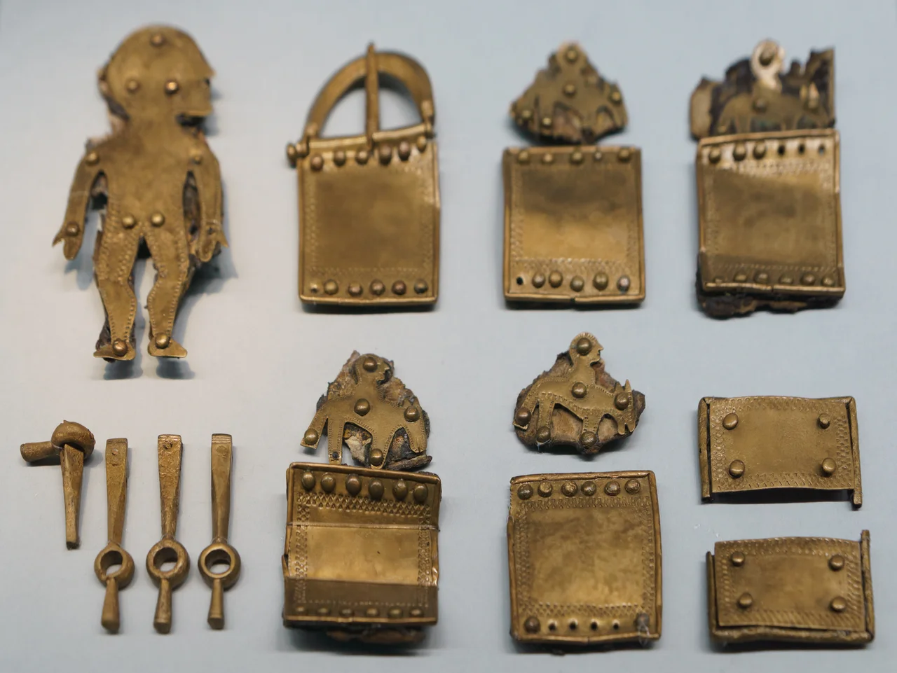 Parts of a baldric showing a man and four mounted horsmen, from Norway. Moesgaard Museum.